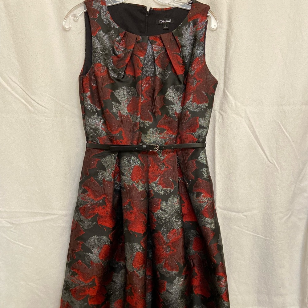 Size 6, red and black designs, with darker gray areas.